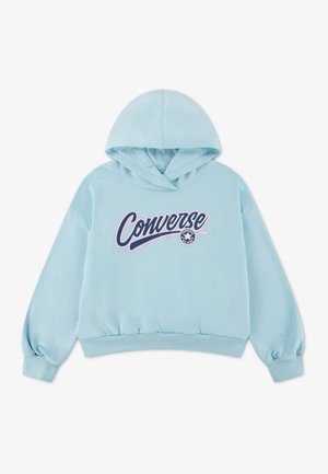 Vaaleansininen huppari, jossa etutasku, joustava vyötärönauha ja pitkät hihat. Varustettu kontrastivärisellä "Converse"-logolla.