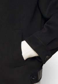 Maje Manteau classique - black