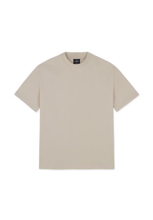 Beige színű pamut póló kerek nyakkal, rövid ujjakkal és laza szabással. Kicsi márkajelzés található a nyaknál. Nincsenek minták vagy díszítések.