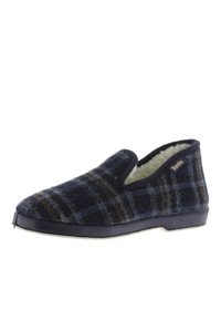 Zapatilla de lana en un patrón de cuadros en azul marino y marrón suave, con un interior suave y cálido. Cuenta con una suela de goma negra y un diseño de calce fácil.