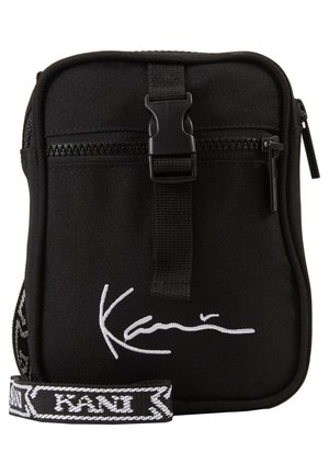 Karl Kani SIGNATURE TAPE MESSENGER BAG - Torba čez telo - black/white