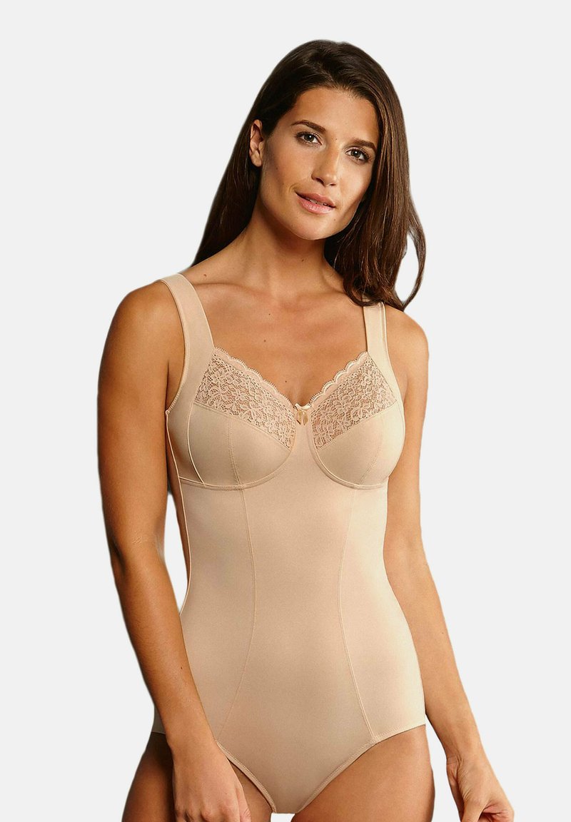 Beige bodysuit with broad straps, lace detailing at the bust, smooth texture, and a fitted design for shaping and support.