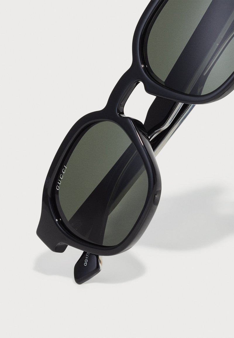 Gucci Lunettes de soleil - black/crystal/grey