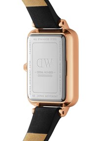Rectangular stainless steel watch with rose gold accents, black leather strap, and engraved details on the back. Water resistant to 3 ATM.