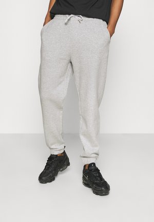 UNISEX - Tracksuit bottoms - mottled light grey