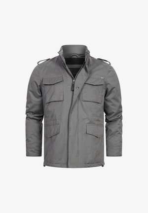 Giacca militare grigia dallo stile moderno, con chiusura a zip, quattro tasche frontali, mostrine sulle spalle e colletto strutturato. Tessuto testurizzato.