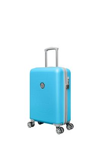 Blauwe harde koffer met een hexagonaal patroon, zilveren ritsen en vier spinnerwielen. Uittrekbare handgreep bovenaan voor gemakkelijke manoeuvreerbaarheid.