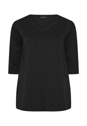 Zwart V-hals top met driekwart mouwen en een losse pasvorm, met een centrale naad aan de voorkant.