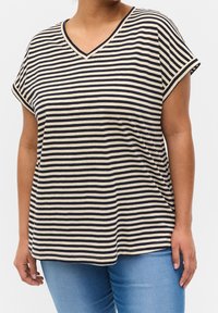 Pruhované tričko v krémové a námořnické modři, s V-výstřihem, krátkými rukávy, volným střihem a měkkou tkaninou s hladkým povrchem.
