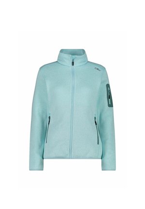 Lyseblå fleecejakke med høj krave, lang lynlås, to lynlåslommer på siden og et patchdesign på venstre arm.