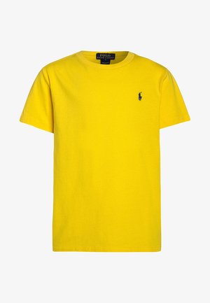 Jasnożółta koszulka z krótkim rękawem i okrągłym dekoltem, z małym granatowym logo Polo Ralph Lauren wyszytym na lewej piersi.