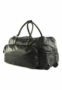 Borsa da viaggio in vera pelle nera con due manici, multiple tasche con zip e due ruote per la mobilità. Superficie testurizzata con dettagli in metallo dorato.
