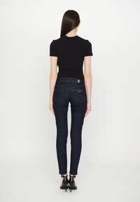 Versace Jeans Couture Mekane hlače - indigo
