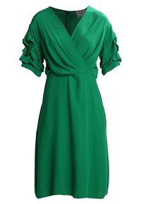 Grön klänning med V-ringning, puffärmar med samlad detalj och en figursydd midja. Tillverkad av ett mjukt tyg, knälång.