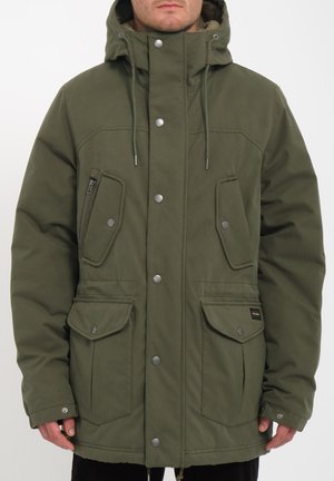 Olive green jacket with a zippered pocket, two front flap pockets, and a cozy hood. Features snap buttons and drawstrings for adjustment.