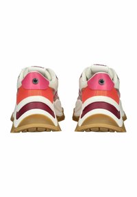 Sport shoes with a multicolored design in pink, red, and cream. Features textured upper, padded collar, and a rubber outsole.