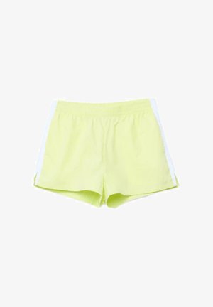 Pantaloncini sportivi color verde chiaro con strisce bianche laterali e cintura elastica, mostrati distesi su uno sfondo bianco.