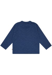 Langärmliges Hemd in Dunkelblau mit weicher Textur und rundem Ausschnitt. Die Rückansicht zeigt einfache, klare Linien ohne Verzierungen.