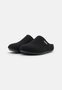 Black felt slip-on slippers with a rounded shape, smooth texture, and rubber sole. Features light stitching and a small logo accent.