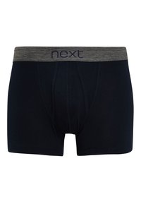 Caleçons boxers pour hommes en bleu marine, fabriqués en tissu doux, dotés d'une ceinture élastique grise avec le logo 'next', affichant un design sans coutures.