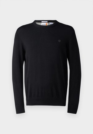 Morbido maglione nero lavorato a maglia con collo rotondo, maniche lunghe, polsini e orlo a costine, e un piccolo logo sul petto. Texture morbida.