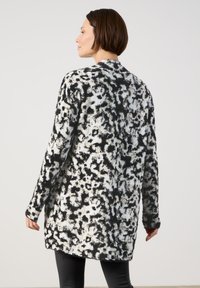 Taifun LONG - Strickjacke - offwhite gemustert