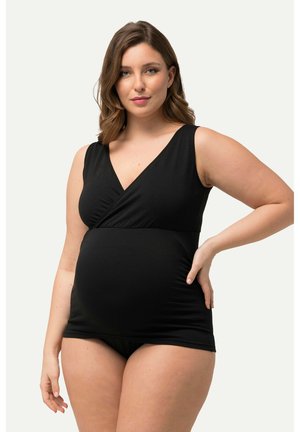 Schwarzes Schwimm-Tankini für Schwangere mit V-Ausschnitt, ärmellosem Design und gerafftem Stoff im Brustbereich, kombiniert mit passenden schwarzen Bikiniunterteilen.