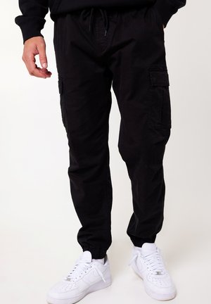 PHARRELL - Cargohose - black