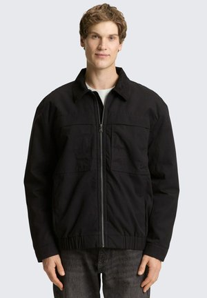 - Kurtka przejściowa