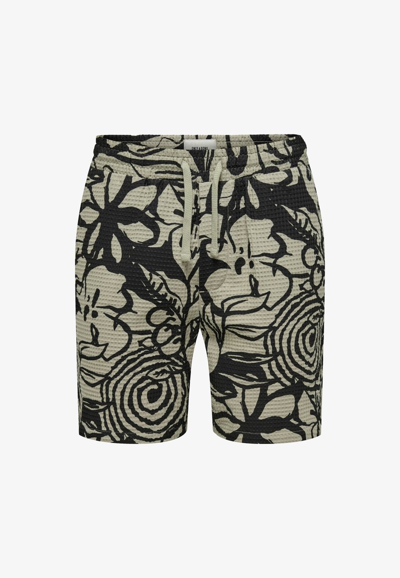 Shorts negros con patrón floral y superficie texturizada, con cinturilla elástica y cordón ajustable. El color principal es verde claro con diseños en negro.