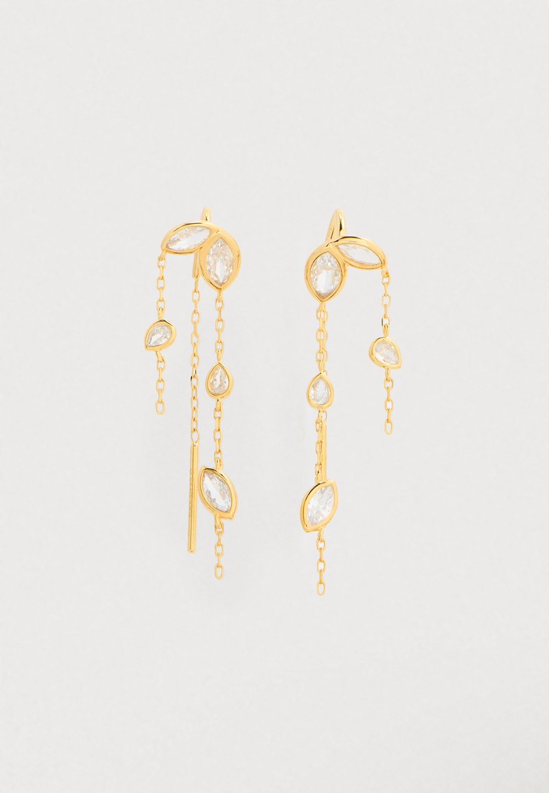 Boucles d'oreilles en ton or avec des chaînes pendantes, présentant des cristaux clairs taillés en marquise de différentes tailles et des accents en forme de feuille.