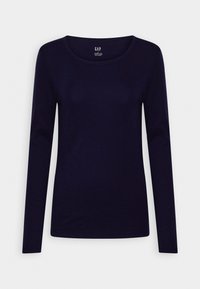 Mörkblå långärmad t-shirt i mjukt tyg. Har en rund hals och en åtsittande design, utan synliga mönster eller dekorationer.