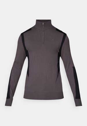 Grauer Pullover mit einem Viertel-Reißverschluss-Kragen, ausgestattet mit schwarzen Seiteneinsätzen und strukturierten Ärmeln. Weicher Stoff mit gerippten Bündchen und Saum.