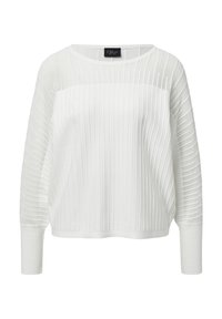 Pull-over blanc avec une texture côtelée, des manches longues et une coupe décontractée. Le design comprend un panneau lisse au niveau de la poitrine.