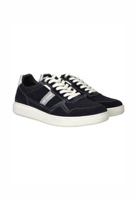 Navy suede sneakers with white laces and rubber soles; features a prominent gray accent with brand lettering on the side.