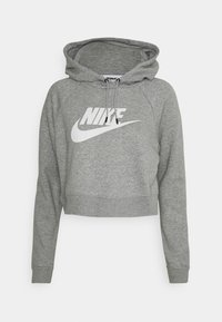 Šedá zkrácená mikina s kapucí z měkké látky, s nastavitelnou šňůrkou u kapuce, s velkým bílým logem Nike na přední straně a žebrovanými manžetami.