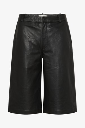 Mustad nahast põlveni ulatuvad lühikesed püksid vööaasa ja peidetud esiklõpsuga.