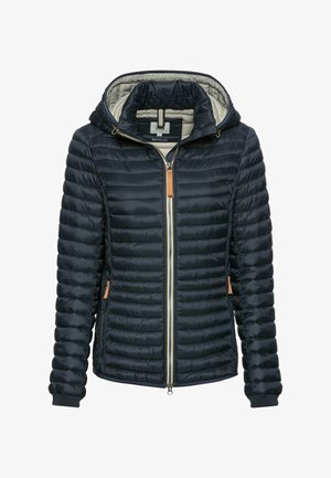 Mørkeblå quiltet hættetrøje med fuld lynlås foran, beige indvendig foring og lynlåsede sidelommer med brune trækflapper.