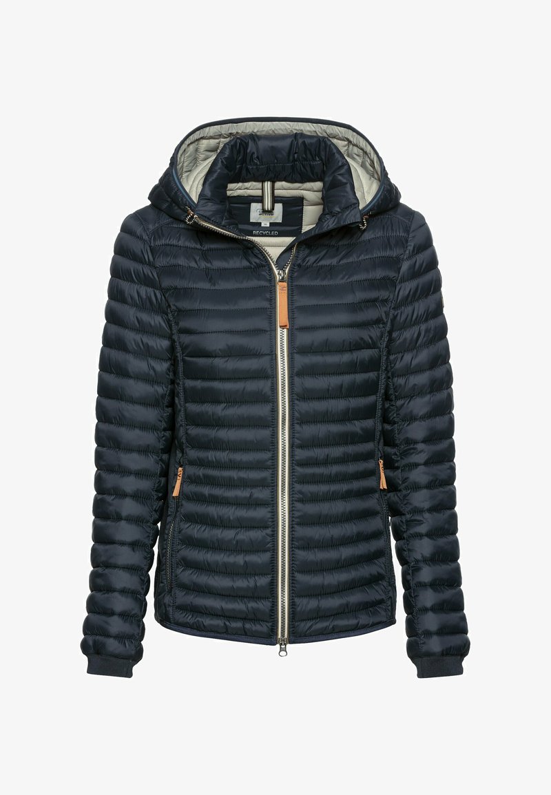 Granatowa pikowana kurtka z kapturem, z pełnym zamkiem z przodu, beżową podszewką oraz kieszeniami bocznymi na zamek z beżowymi uchwytami.