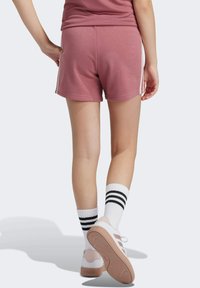 adidas Performance ESSENTIALS 3-STRIPES - Sports shorts - preloved crimson sandy pink