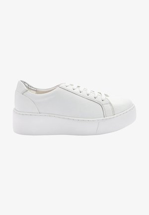 White leather sneaker with a low top design, thick platform sole, rounded toe, and five eyelet lace-up closure. Smooth texture and minimal detailing.