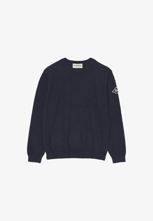 Maglione blu navy realizzato in morbido tessuto a maglia, con collo rotondo, polsini a coste e un’etichetta con logo a forma di diamante sulla manica sinistra.