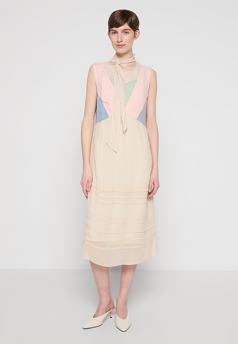 Coach Jurk lichtgeel Coach Jurk lichtgeel