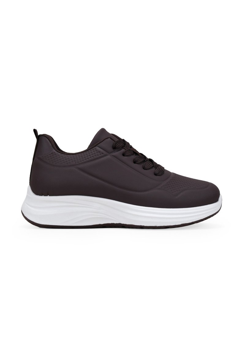 Black athletic shoe with a smooth, textured upper, padded collar, and white sole. Features lace-up design and pull tab at the heel.