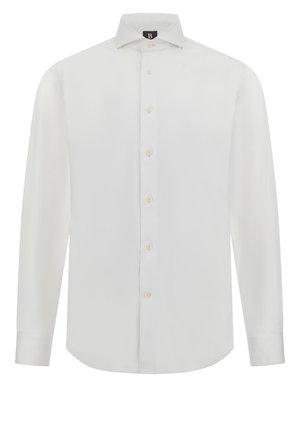Chemise blanche à manches longues en tissu lisse, avec une fermeture à boutons sur le devant, un col pointu et des boutons beige, dotée d'un ourlet arrondi.