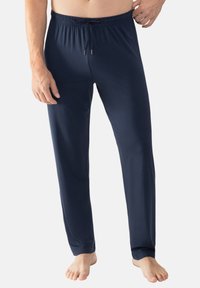 Marinblå, lätta loungebyxor av mjukt tyg med elastisk midja och dragsko samt rak bendesign.