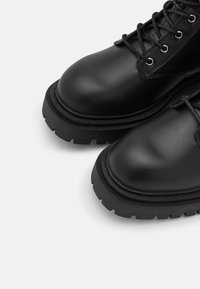 Zign Bottes à plateau - black