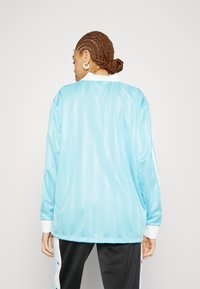 adidas Originals WWC SOCCER - Blusa - light aqua