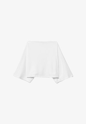 Vêtement blanc oversize à manches larges, confectionné dans un tissu doux, présentant un design minimaliste et une forme ample et fluide.