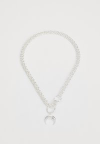 Valittu, shiny silver-coloured